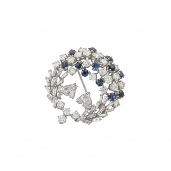 Brooch with 2 horse head cut diamonds 