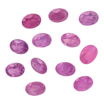 Konvolut von 12 beerenfarbenen Saphiren von zus. ca. 19,7 ct,