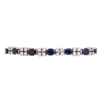 Bangle with 7 oval faceted sapphires,