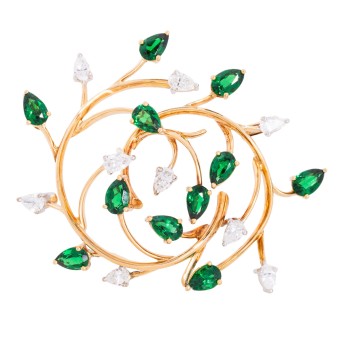 Florale Brosche mit Tsavorith- und 9 Diamanttropfen zus. ca. 1,25 ct,