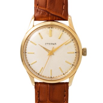 Eterna vintage men's watch in 14K yellow gold. 