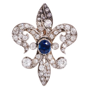 Brosche 'Fleur de Lys' mit Saphir