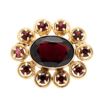Brosche mit oval facettiertem Granat,