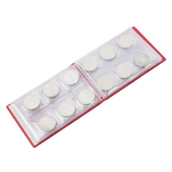 Kleines Album mit Münzen aus Kanada, der Schweiz und den USA. 39 Stück.