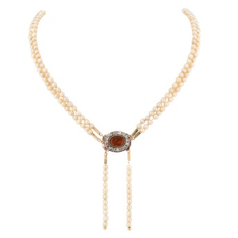Pearl necklace with amber diamond clasp,