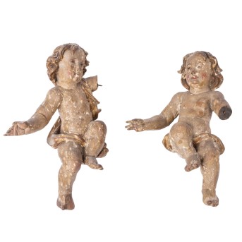 PAIR OF CARVED PUTTI