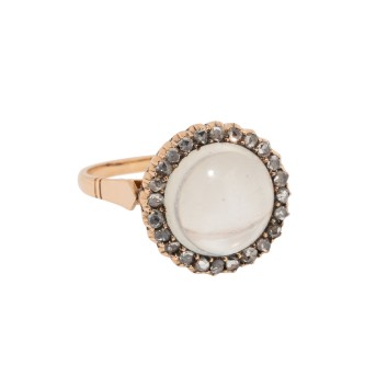 Ring with moonstone surrounded by diamond roses,