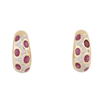 Paar Ohrsteckclipse mit 14 oval facettierten Rubinen,