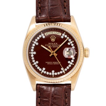 ROLEX ROLEX Day-Date 36 mit seltenem 'Oxblood Stella Diamond String Dial' Ref 18038 Herrenuhr von ca. 1979.