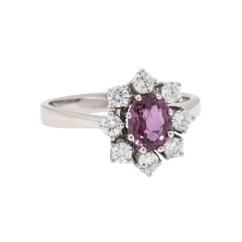 Ring with ruby surrounded by diamonds