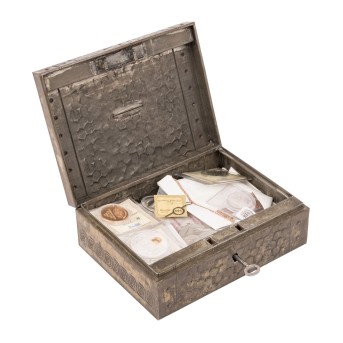 Treasure trove in a small tin box, including