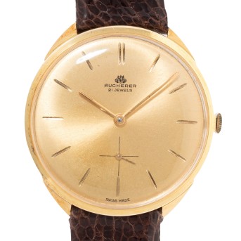 BUCHERER Vintage Armbanduhr in 18K Gold mit Box.