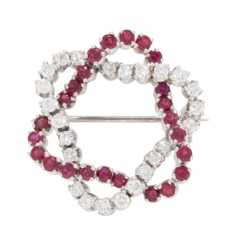 Knotenbrosche mit Rubinen und 24 Brillanten,
