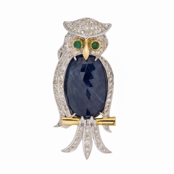 Brosche 'Eule' mit 1 ovalen Safir im Brioletteschliff und 100 Brillanten ca. 1.20 ct.