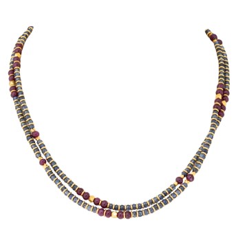 Lange Kette aus Rubin- und Saphirrondellen,