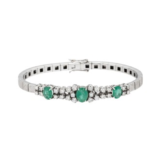 Armband mit 3 Smaragden und 26 Brillanten zus. ca. 1,3 ct.