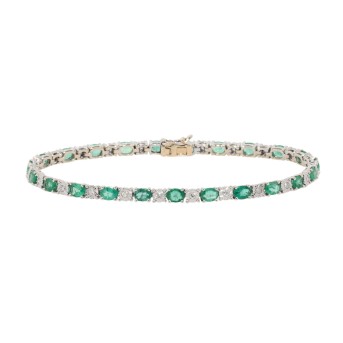 Tennisarmband mit Smaragden zus. 3,2 ct und Diamanten