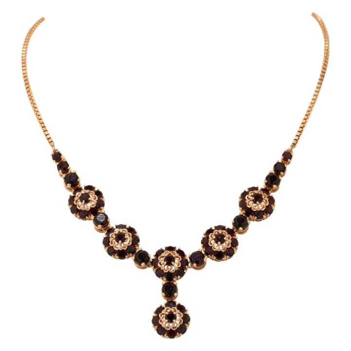 Necklace centerpiece of flower rosettes set with garnet, 