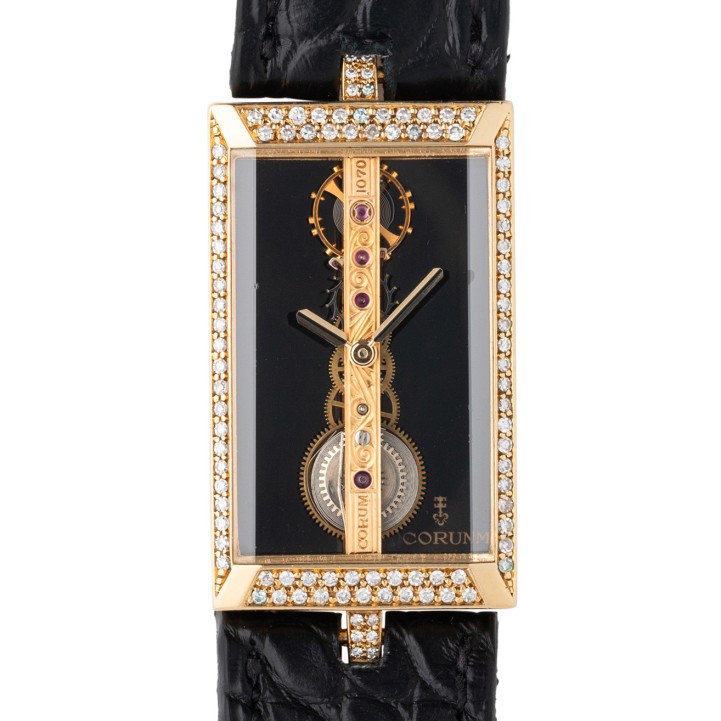 CORUM Golden Bridge, Ref. 13.151.56 in 18K Gelbgold mit Box und Papieren von 1996. 