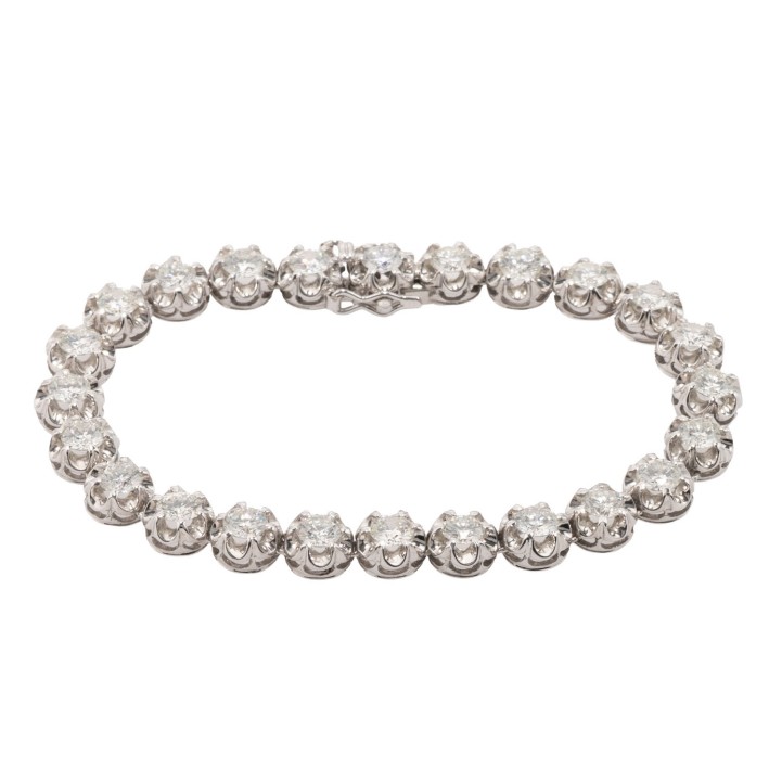 Tennisarmband mit 24 Brillanten zus. 7,7 ct,  