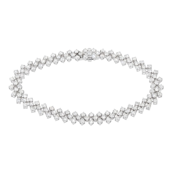 Tennisarmband mit 129 Brillanten von zus. 5,8 ct,  