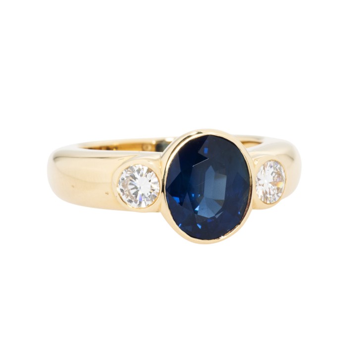 WEMPE Ring mit Saphir flankiert von Brillanten  
