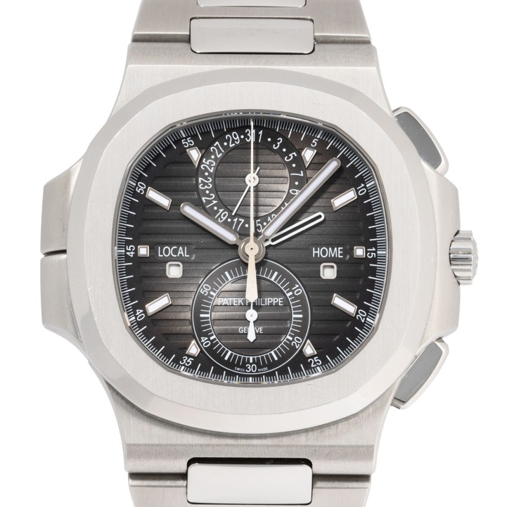 PATEK PHILIPPE Nautilus Travel Time Ref 5990/1A-001 Herren Chronograph von 2019 mit Box und Papieren.  