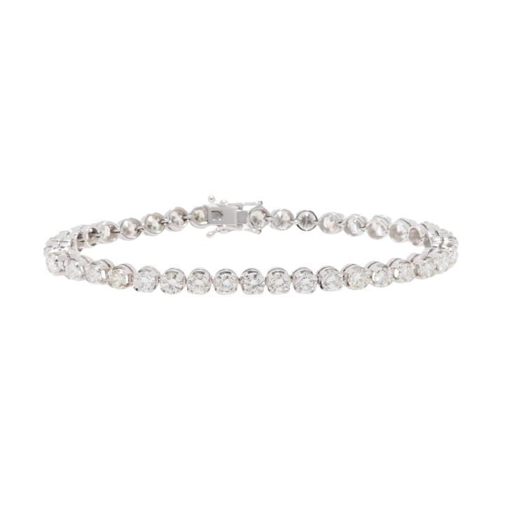 Tennisarmband mit 38 Brillanten zus. ca. 6,9 ct, 