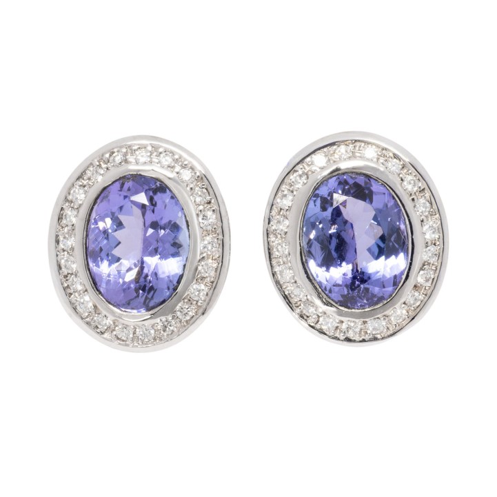 Ohrstecker mit ovalen Tansaniten 3,6 ct. umrahmt mit Brillanten zus. 0,25 ct. 