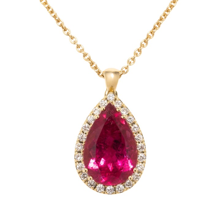 Anhänger mit einem feinen Rubellit-Tropfen von 5,0 ct., umrahmt mit Brillanten zus. 0,25 ct. 