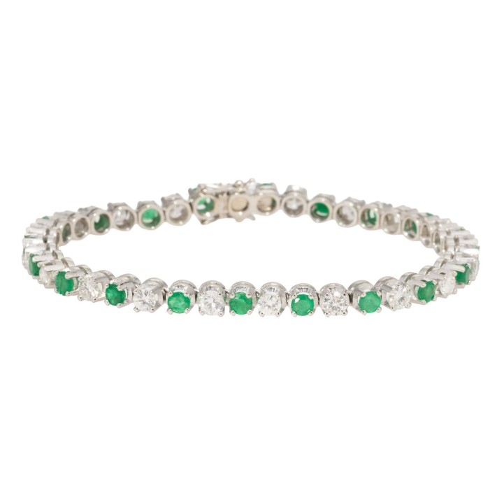 Tennisarmband mit 20 Smaragden sowie 20 Brillanten von zus. ca, 4,00 ct.  