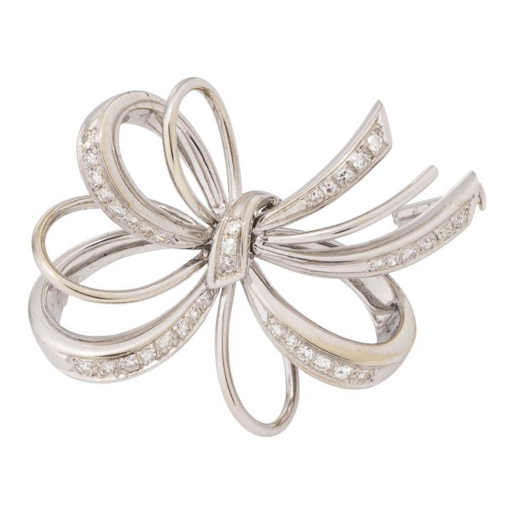 Brosche 'Schleife', besetzt mit Achtkant-Diam. 0,74ct.  graviert. 