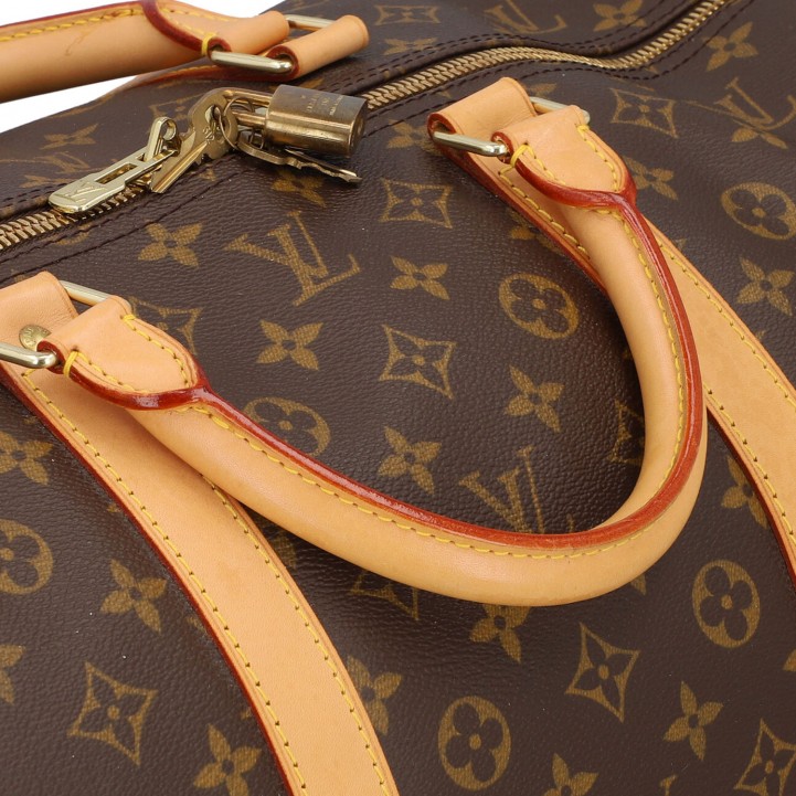 Sold at Auction: LOUIS VUITTON Weekender KEEPALL 45 BAND.