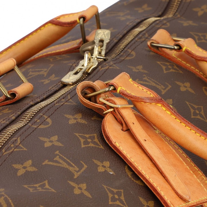 Sold at Auction: A Classic Louis Vuitton Keepall Bandoulière 55 Travel  Holdall. The monogrammed chocolate canvas exte